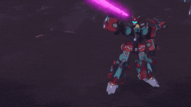 a purple light beam is coming out of the ground in the dark