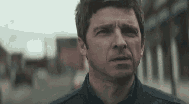 Looking Up Noel Gallagher GIF - Looking Up Noel Gallagher Ballad Of The Mighty I Song GIFs