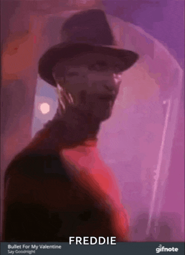 freddy krueger from a nightmare on elm street is wearing a hat and a red shirt