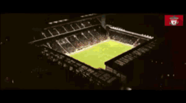 a banner that says ' i 'll never walk alone ' is hanging on a wall