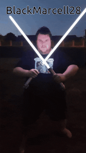 a man is holding two lightsabers in front of a sign that says black marcell28
