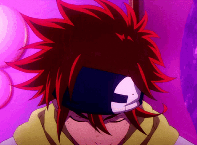 a close up of a person with red hair wearing a bandana