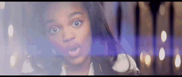 a woman with a surprised look on her face
