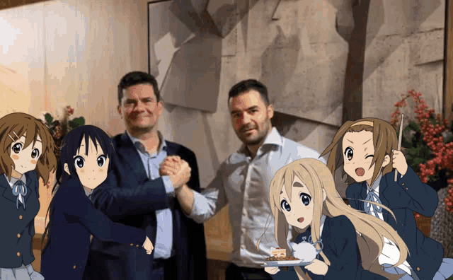 a group of anime characters are posing for a picture with two men