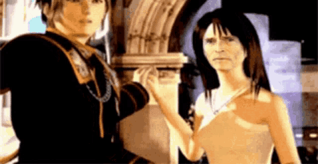a man and a woman are standing next to each other in a video game scene .