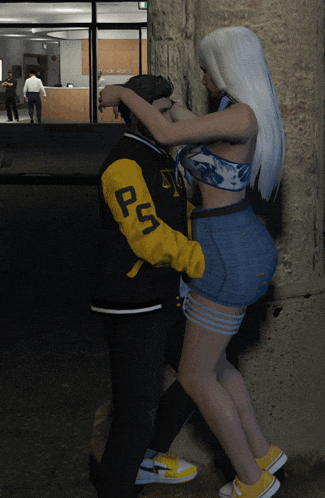a woman standing next to a man wearing a jacket with the letter ps on it