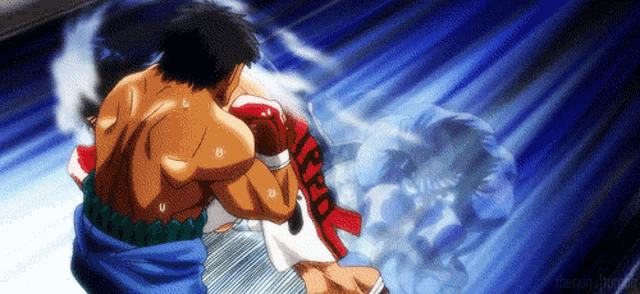 two boxers are fighting in a ring and one of them is wearing gloves with the letter r on it