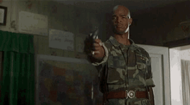a man in a camouflage uniform says if he 's still in there he ain t happy