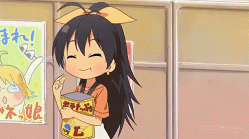 a cartoon girl is smiling while holding a bag that says ' e ' on it