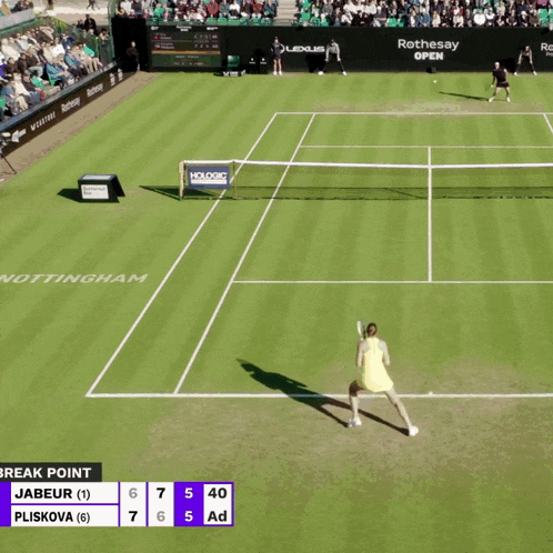 a woman in a yellow dress is holding a tennis racquet on a tennis court in front of a lexus advertisement