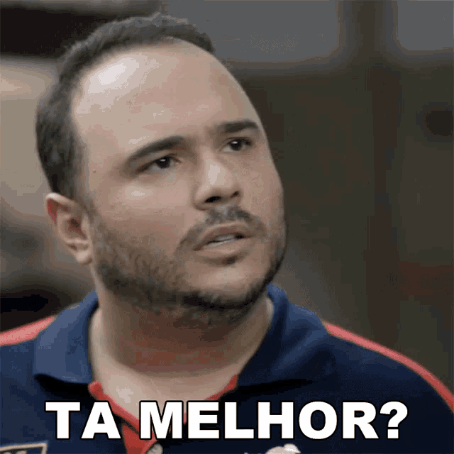 a man with a beard has the words ta melhor written on his face