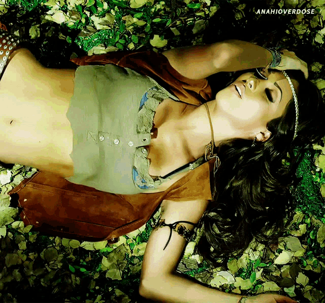 a woman is laying on the ground with anahioverdose written on the bottom