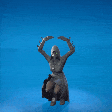 a woman in a hooded coat with a bird on her head is standing on a blue background
