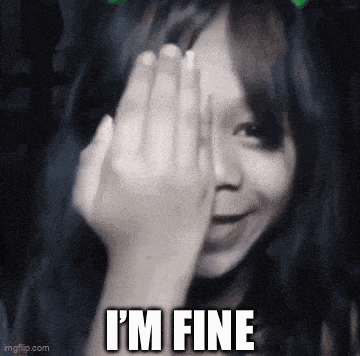a girl is covering her face with her hand and the words `` i 'm fine '' are written on the bottom .