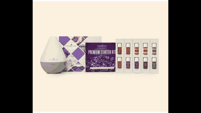 a young living essential oils starter kit with a diffuser