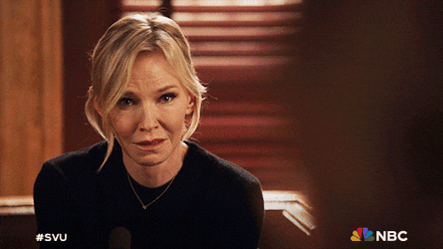 a nbc ad with a woman in a black sweater