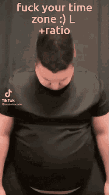 a man in a black shirt says fuck your time zone : l ratio