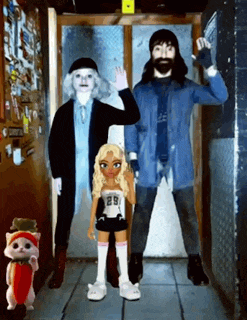 a man with a beard is standing next to a girl and a cat