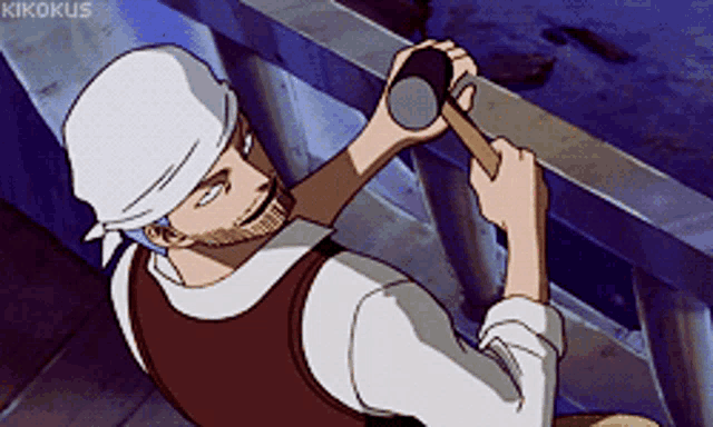 a man with a bandana on his head holds a hammer
