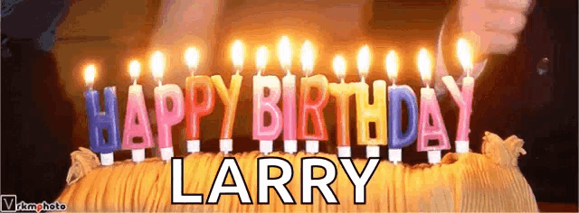 a birthday cake with the words happy birthday larry on it