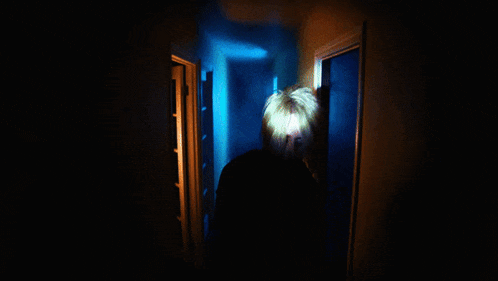 a blurry picture of a person in a hallway