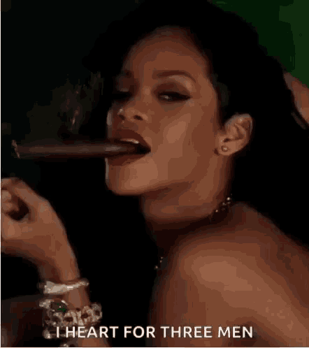 a woman is smoking a cigar with the words `` i heart for three men '' written on the bottom .