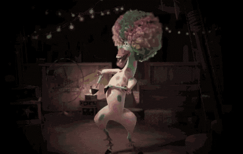 a cartoon character is dancing in a dark room with a sign that says ' slack ' on it
