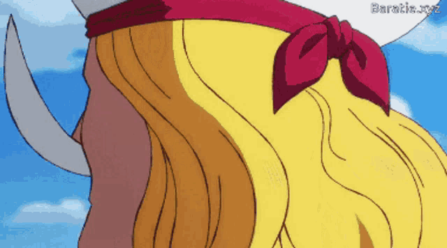a close up of a person 's hair with a red bow and the words barabie.xyz written on the bottom