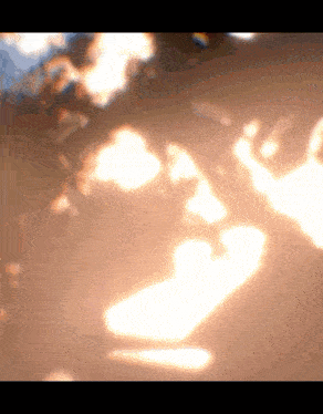 the sun shines through the branches of a tree casting a shadow