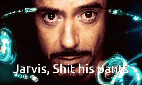 a close up of a man 's face with the words jarvis shit his pants