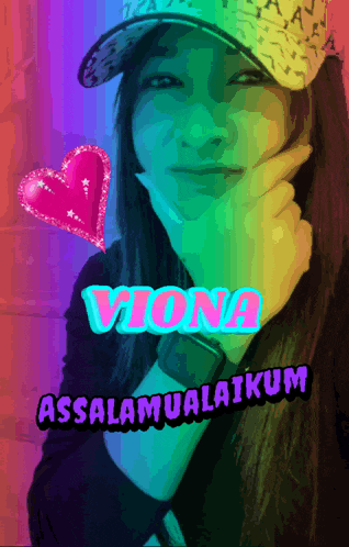 a girl wearing a hat with the name viona written on it