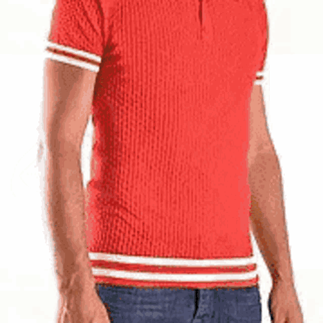 a man is wearing a red polo shirt with white stripes on the sleeves .