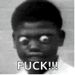 a black and white photo of a young man with big eyes and the words `` fuck ! ''