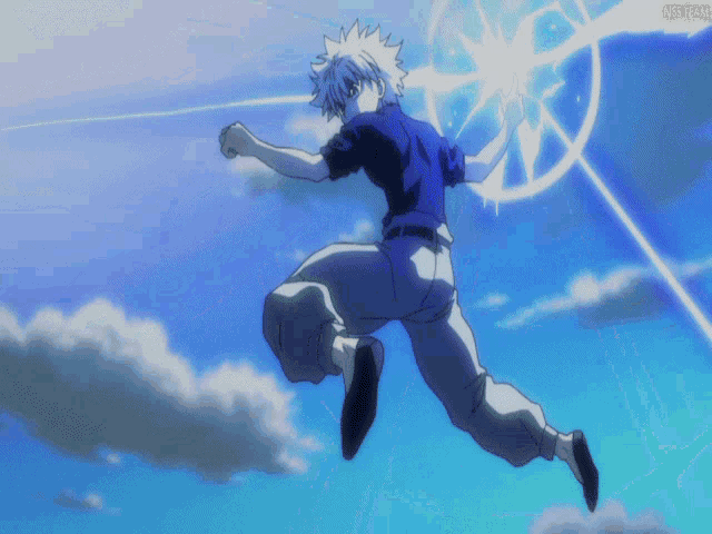 a man in a blue shirt is jumping in the air with a blue light behind him