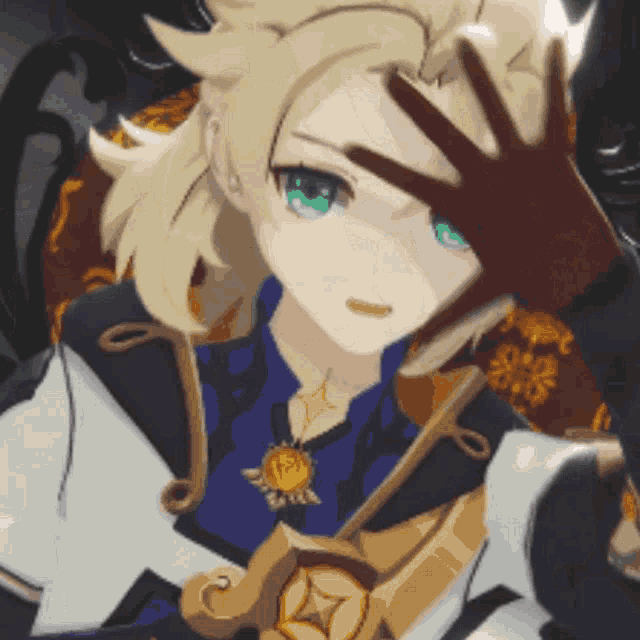 a close up of a person 's hand touching another person 's head