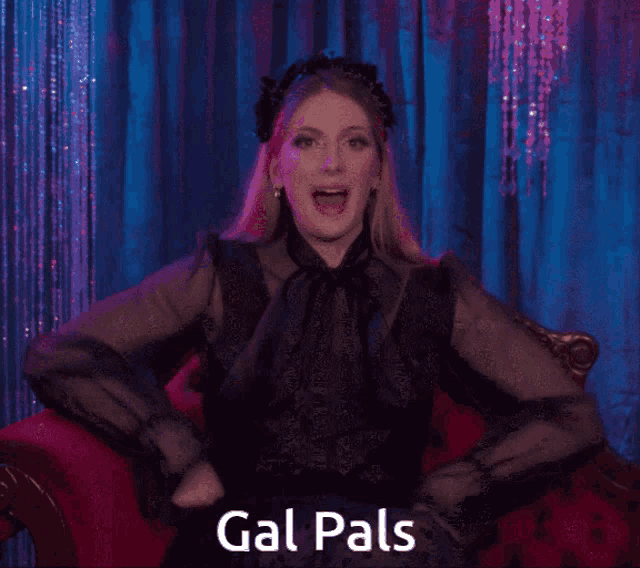 a woman in a black dress is sitting on a red couch with the words gal pals written on the bottom