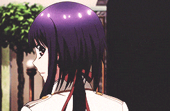 a girl with purple hair is wearing a white shirt