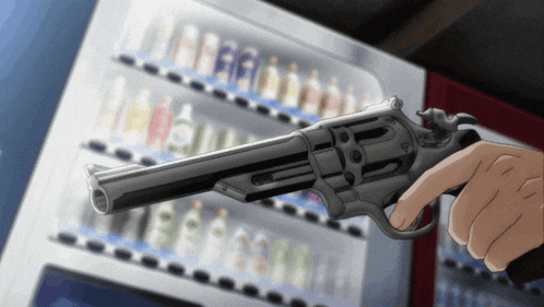 a person is pointing a gun at a vending machine