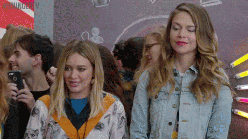 Glance Whatever GIF - Hilary Duff Awkward Smile Younger Tv GIFs