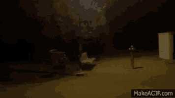 a park at night with a makeagif.com link in the bottom right corner