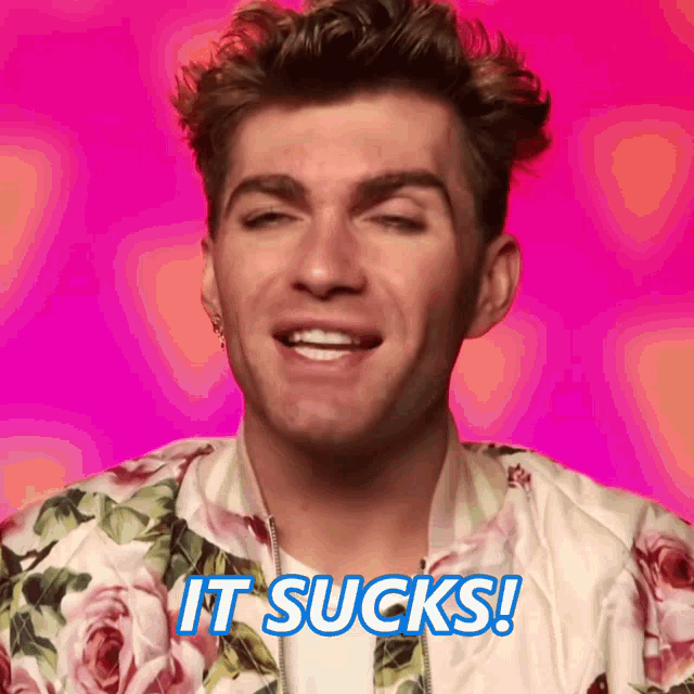 a man in a floral jacket says it sucks in blue letters