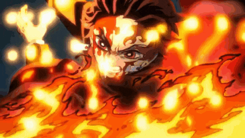 a close up of a person surrounded by flames and fire .