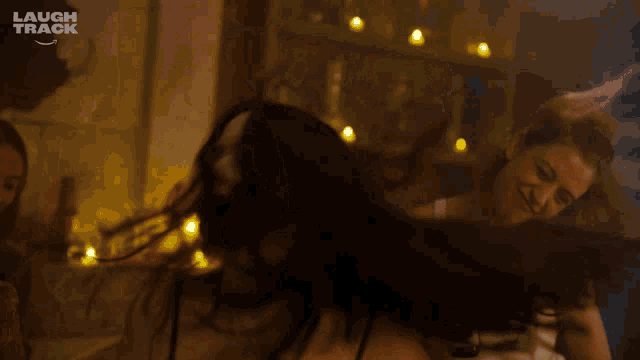 a laugh track ad with a woman dancing