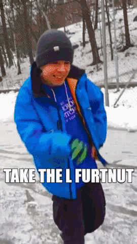a boy in a blue jacket is dancing in the snow with the words take the l furtnut on the bottom