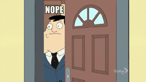 a man in a suit and tie is peeking out of a door that says nope on it