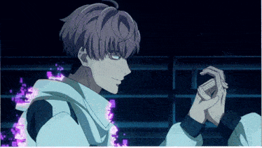 a man with purple hair and a white hoodie is holding his hands together