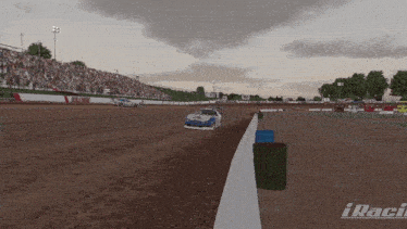 a video game screen shows a race track and the word iraci on the bottom