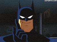 a close up of a cartoon batman with gifwave.com in the corner