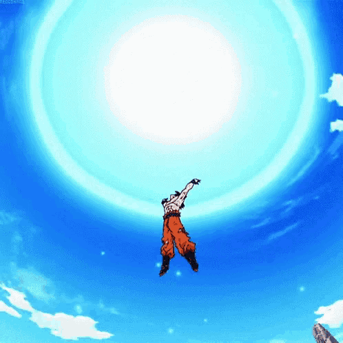 a man in orange pants is flying through the air in front of a blue circle