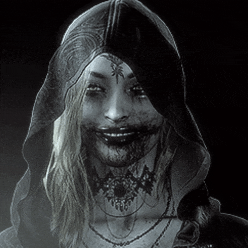 a black and white photo of a woman wearing a hood and necklaces